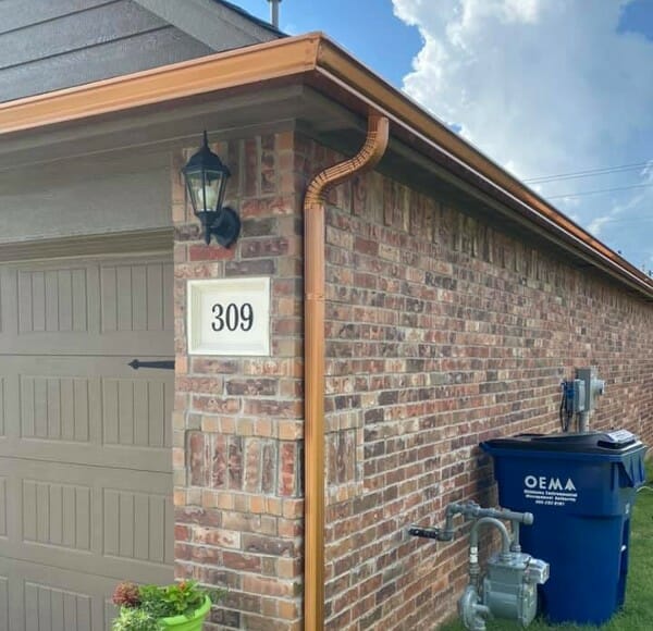 New bronze gutter and downspout